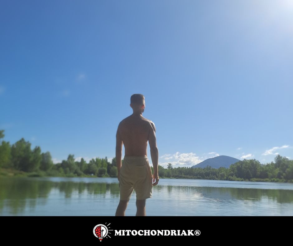 Man by a lake in sunlight and nature for vitamin D production